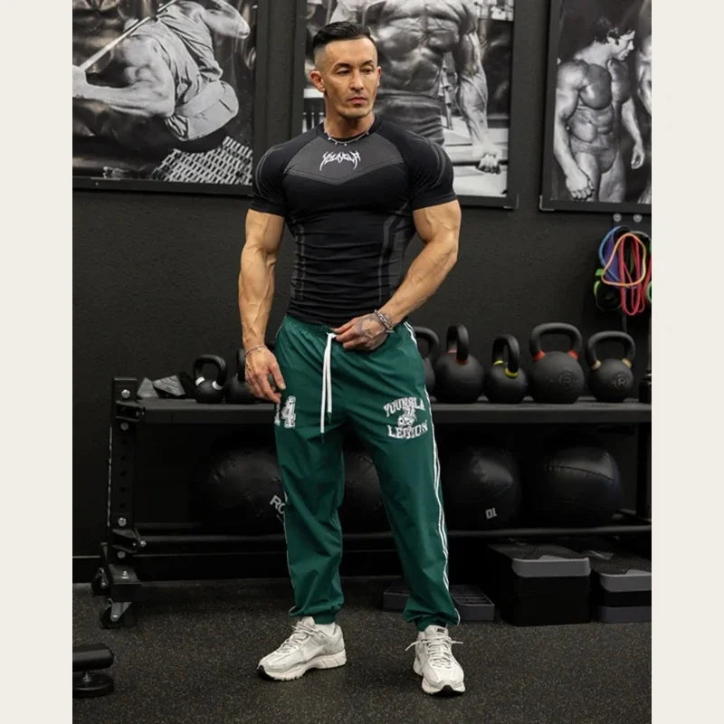 2025 YOUNGAL New Men's Fitness T-shirts clothing sports Tshirt tights high elastic training short sleeve fitness man clothing